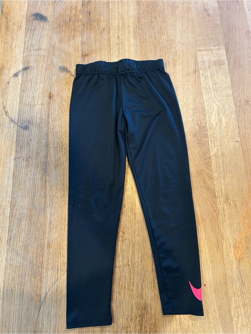 Nike Kids Black Leggings with Pink Swoosh Accent